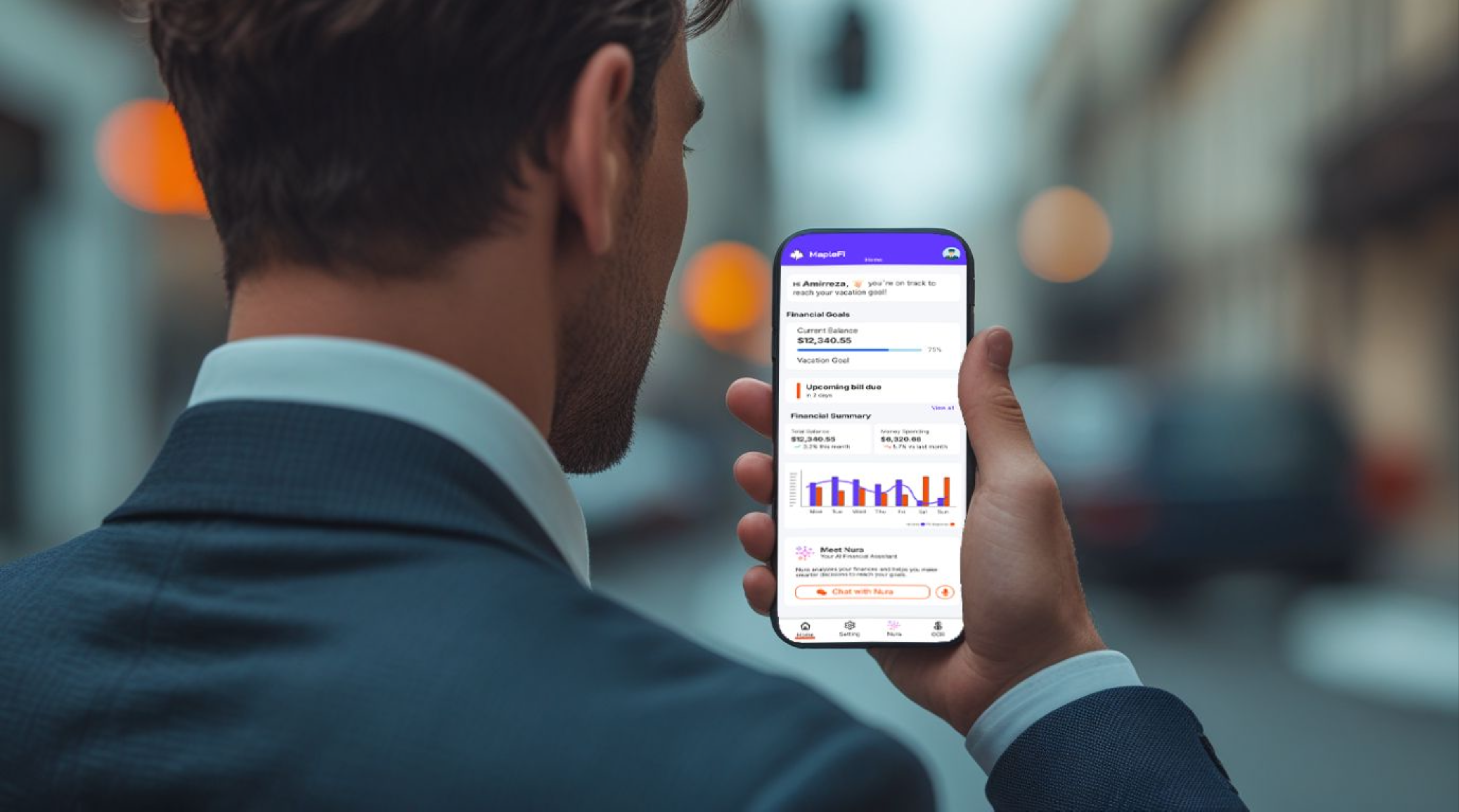 a man holding mobile using MapleFi